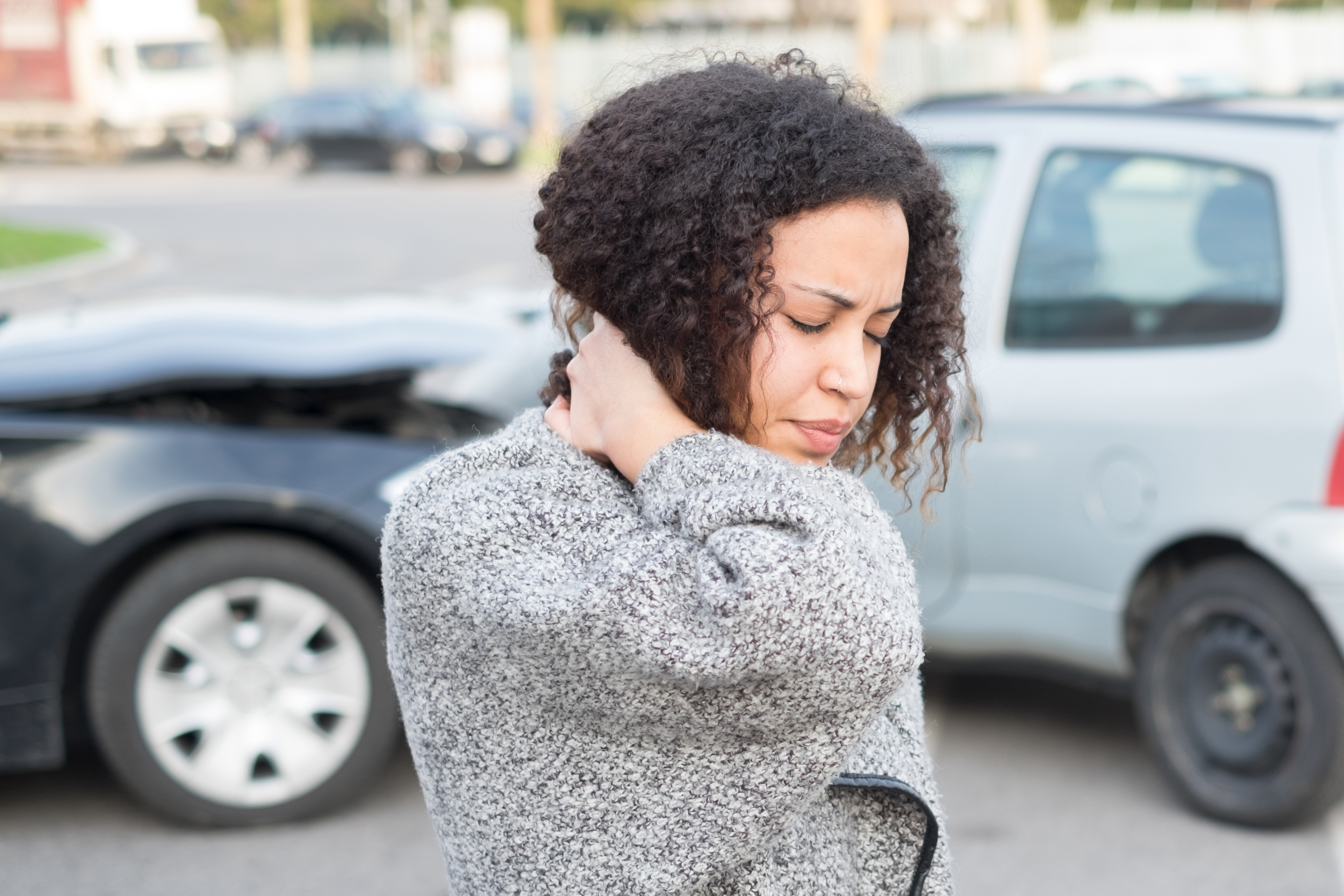 Woman with a Hurt Neck from a Car Accident